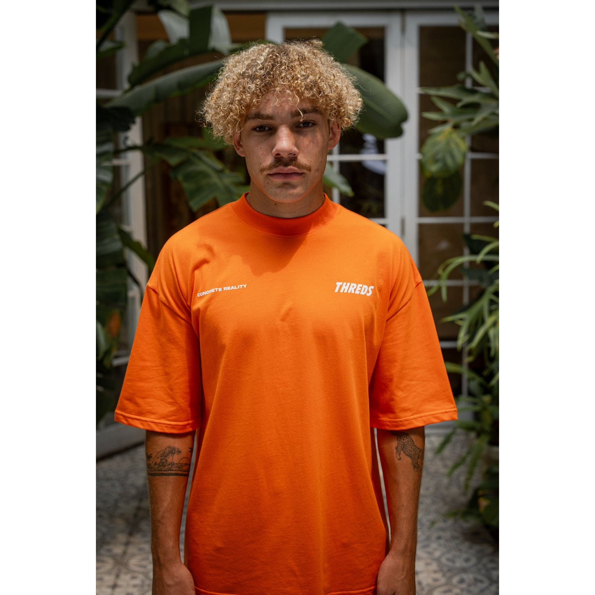 Orange “Principle” T-Shirt