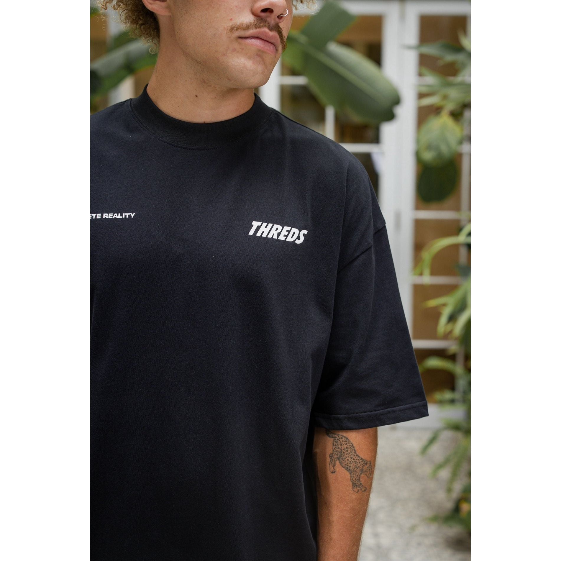 Black “Principle” T-Shirt